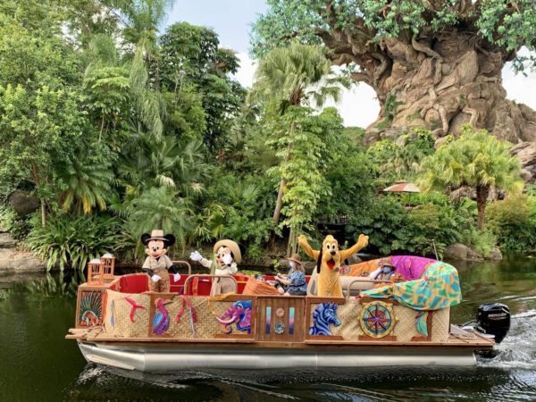 Disney characters on a boat at Animal Kingdom theme park