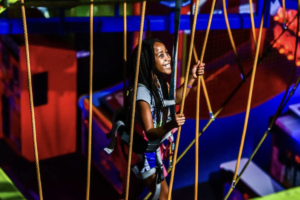 Girl on the ropes course at WonderWorks Orlando